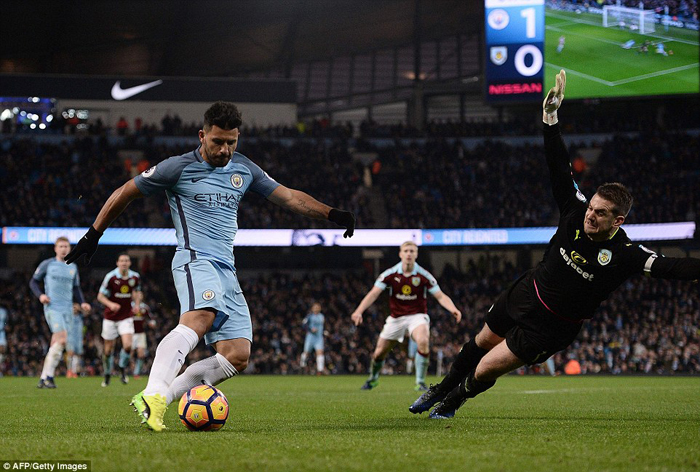 Aguero puts his side 2-0 up just four minutes after Clichy's opener by beating Heaton from a tight angle