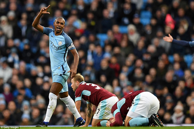 Fernandinho tries to suggest he was not worthy of a red card during Manchester City's home clash against Burnley